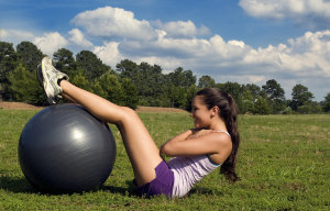 15252-a-young-woman-stretching-outdoors-before-exercising-pv